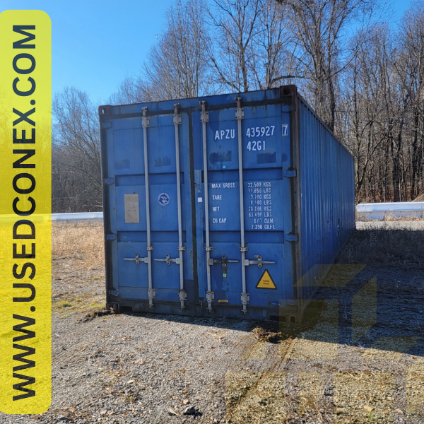 A blue one-trip shipping container at a delivery site